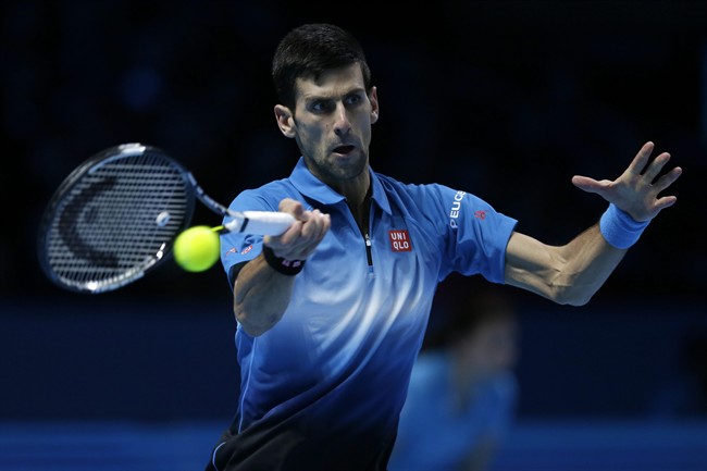 Serbia's Novak Djokovic plays a return to Spain’s Rafael Nadal during their ATP World Tour Finals tennis match at the O2 Arena in London England Saturday Nov. 21 2015