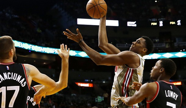 Nov 8 2015 Miami FL USA Miami Heat center Hassan Whiteside shoots the ball as Toronto Raptors guard Kyle Lowry and center Jonas Valanciunas defend in the second half at American Airlines Arena. The Heat won 96-76. Robert Mayer-USA TODA