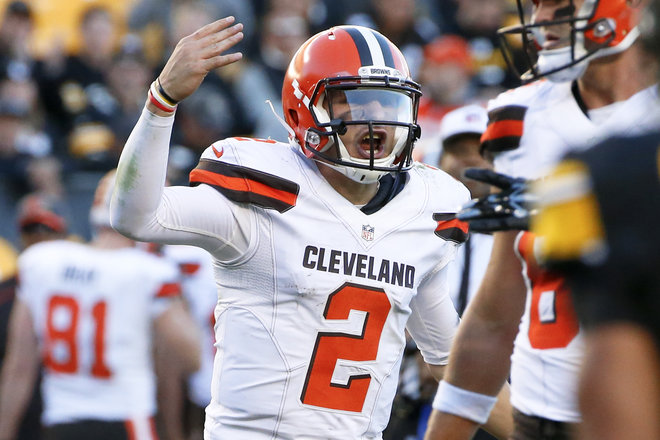 Cleveland Browns quarterback Johnny Manziel plays during an NFL football game against the Pittsburgh Steelers in Pittsburgh. Browns coach Mike Pettine says he benched Johnny Manziel because the quarterback