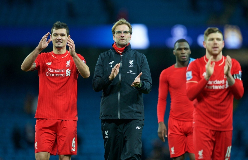 Liverpool's Dejan Lovren and manager Jürgen Klopp after the 4-1 victory over Manchester City during the Premier League match at the City of Manchester Stadium