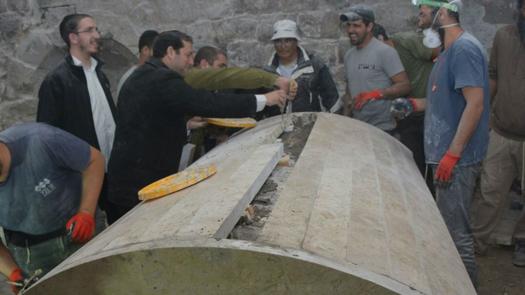 Repairs are carried out at Joseph's Tomb on the outskirts of Nablus overnight