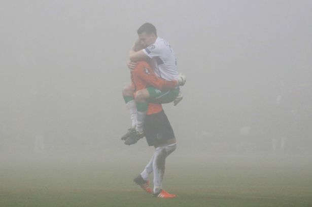 Darren Randolph and Seamus Coleman celebrate after Robbie Brady scored the first goal for Republic of Ireland