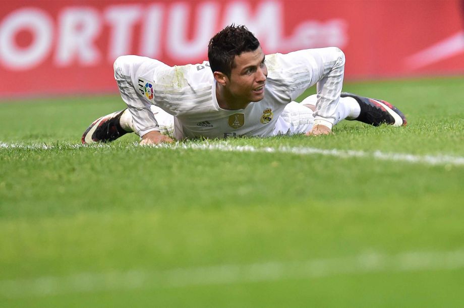 Real Madrid's Cristiano Ronaldo of Portugal laments after missing a goal during their Spanish La Liga soccer match between SD Eibar and Real Madrid at Ipurua stadium in Eibar northern Spain Sunday Nov. 29 2015. Real Madrid won the match 2-0