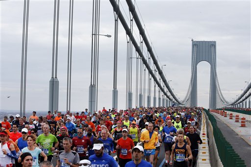 Runners cross the Verrazano Narrows Bridge at the start of the New York City Marathon Sunday Nov. 1 2015 in New York