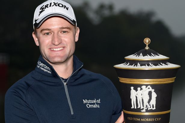 Russell Knox with the trophy in Shanghai