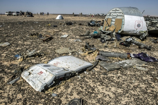 Debris belonging to the A321 Russian airliner at the site of the crash in Wadi el-Zolmat a mountainous area in Egypt's Sinai Peninsula