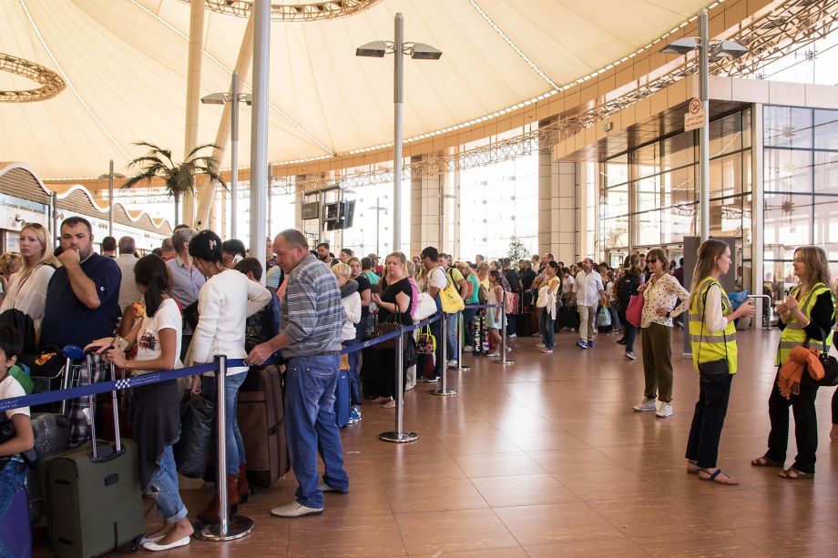 Tourists wait in slow-moving security lines at the Sharm el Sheikh airport in Egypt as they try to board charter flights home. Many complained about a lack of information from travel agents