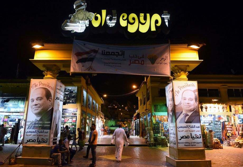 Posters of Egyptian President Abdel Fattah el Sissi adorn a deserted tourist market in Sharm el-Sheikh