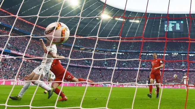 Bayern Munich midfielder Arjen Robben scores the opening goal during the German first division football Bundesliga match between FC Bayern Munich and VfB Stuttgart