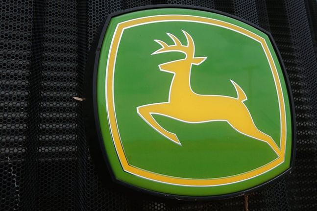 Deere farming logo at a farming equipment dealership in Petersburg Ill. Even though sales of its green tractors dozers and other equipment fell sharply Deere & Co. reported better-than-expected fourth