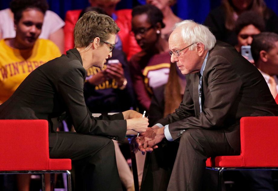 Democratic presidential candidate Sen. Bernie Sanders I-Vt right talks with MSNBC's Rachel Maddow during a democratic presidential candidate forum at Winthrop University in Rock Hill S.C. Friday Nov. 6 2015