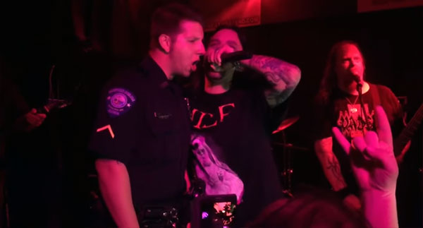 Officer fired for singing about killing with metal band while in uniform