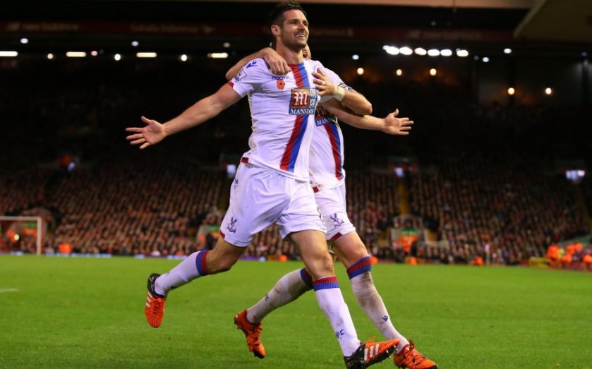 Scott Dann's 81st-minute header lifted Palace to seventh in the table and inflicted Jurgen Klopp's first defeat as Liverpool boss