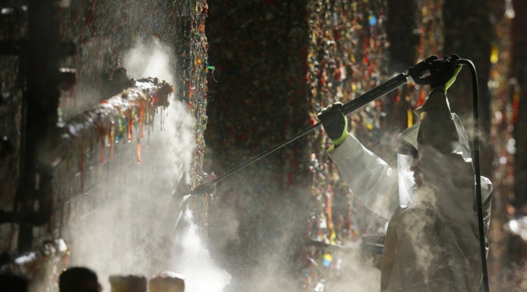 AP PHOTOS: Seattle's famed 'gum wall' gets a fresh start