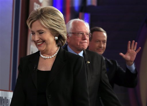 Democratic presidential candidates Hillary Rodham Clinton Bernie Sanders and Martin O'Malley take the stage during a Democratic presidential primary debate Saturday Nov. 14 2015 in Des Moines Iowa