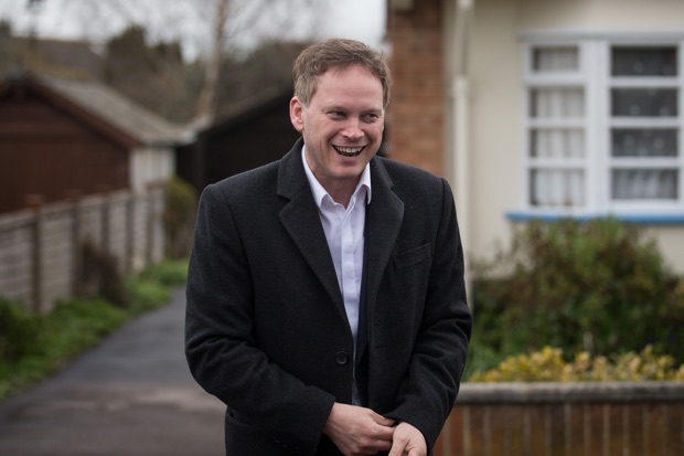 Conservative Party Chairman Grant Shapps arrives to meet Conservative party activists as he helps with their canvassing in a residential area of Street