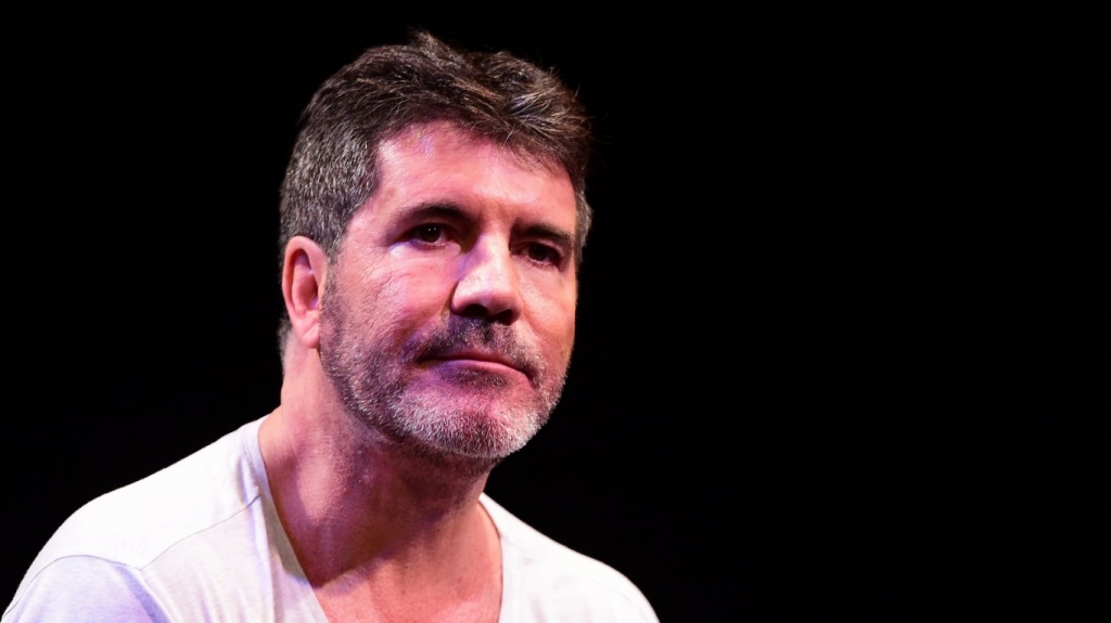 Simon Cowell hails One Direction after emotional final gig before break