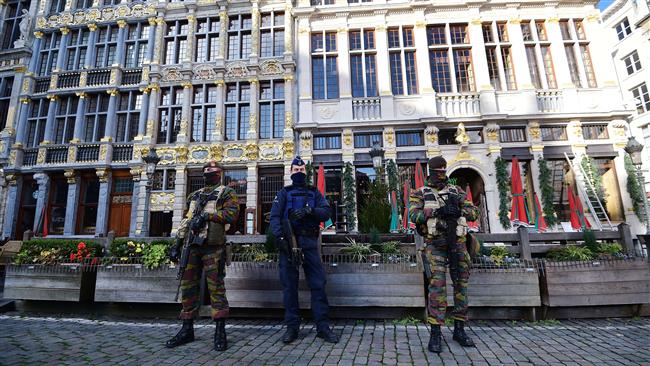 Soldiers and police are seen near Brussels’ Grand Place as the Belgian capital remains on the highest alert level