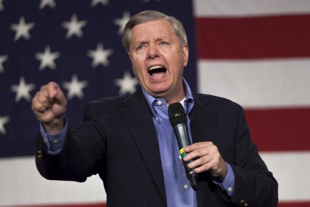 Republican presidential candidate Lindsey Graham speaks at the Growth and Opportunity Party at the Iowa State Fairgrounds in Des Moines Saturday