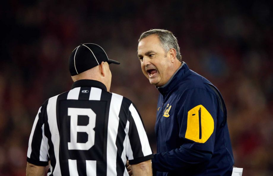 PALO ALTO CA- NOVEMBER 21 Head coach Sonny Dykes of the California Golden Bears argues with back judge Joe Johnston during their game against the Stanford Cardinal at Stanford Stadium