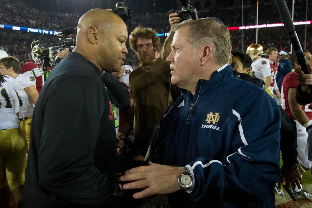 Stanford's Brian Shaw and Notre Dame's Brian Kelly.- Matt Cashore-USA TODAY Sports