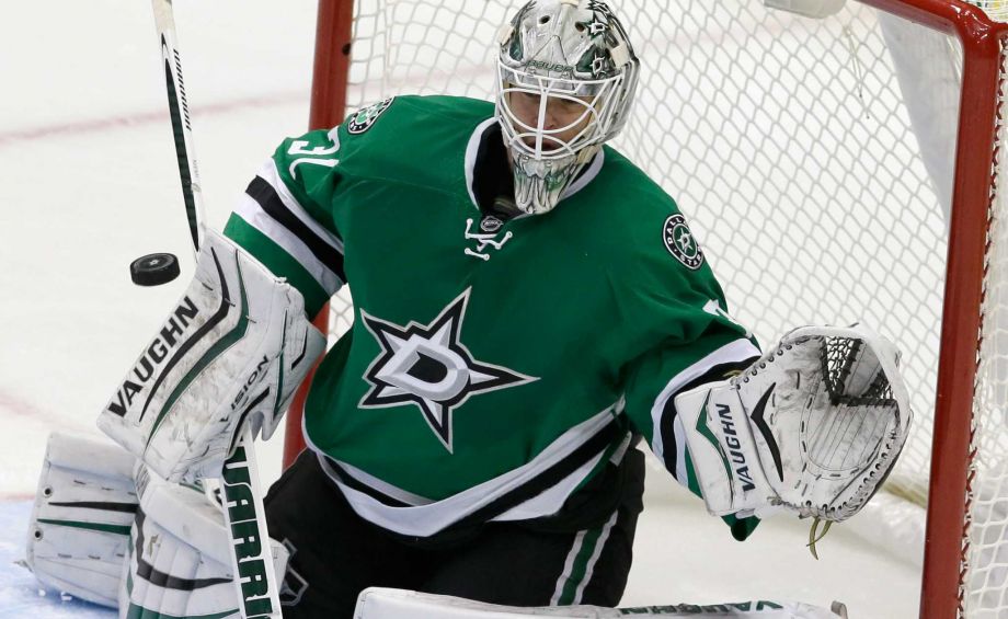 Dallas Stars goalie Antti Niemi blocks a shot during the third period of an NHL hockey game against the San Jose Sharks Saturday Oct. 31 2015 in Dallas