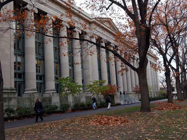 Students walk through the Harvard Law School area on the campus of Harvard University in Cambridge Mass. in this Nov. 19 2002 file