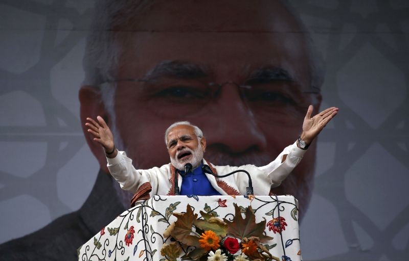 Prime Minister Narendra Modi addresses a rally in a cricket stadium in Srinagar