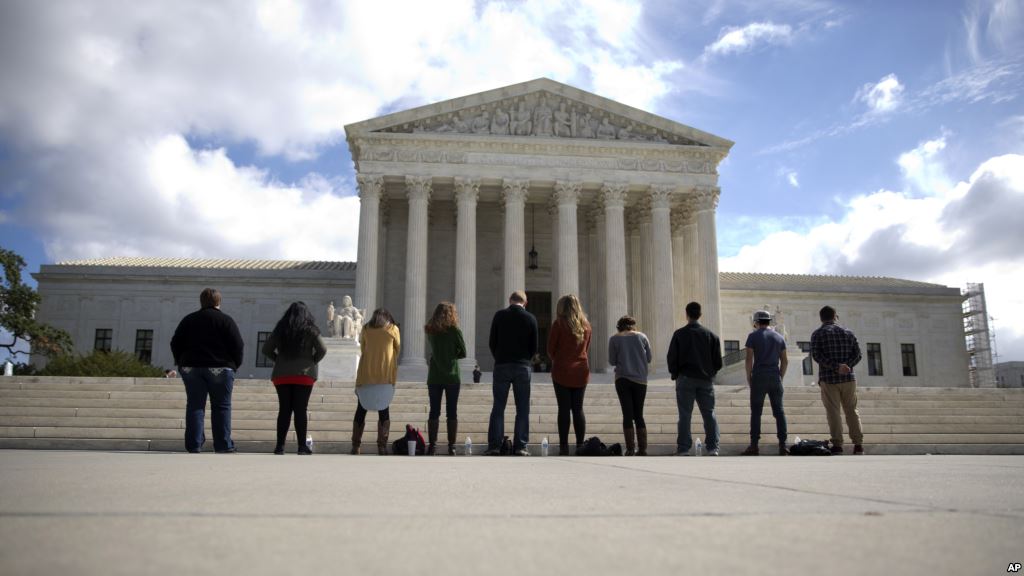 FILE- Members of a group called'Bound 4 Life gather in front of the Supreme Court in Washington to protest the ideology of abortion Oct. 5 2015