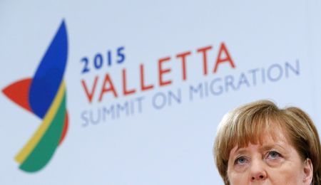 UK-EUROPE-MIGRANTS-GERMANY-MERKEL:Merkel under fire over refugees says I m fighting for my vision