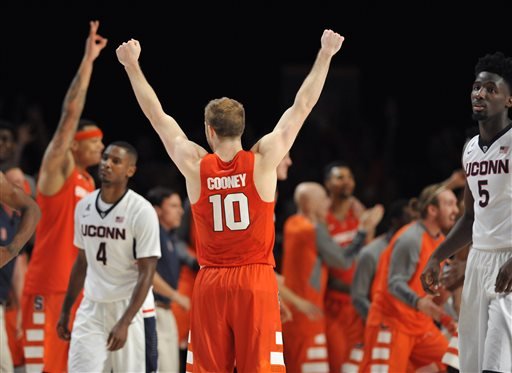 Syracuse guard Trevor Cooney celebrates at the end of the team's NCAA college basketball game against Connecticut in the semifinals of the Battle 4 Atlantis Thursday Nov. 26 2015. Syracuse defeated Connecticut 79-76. (Brad Horrigan  The Courant via