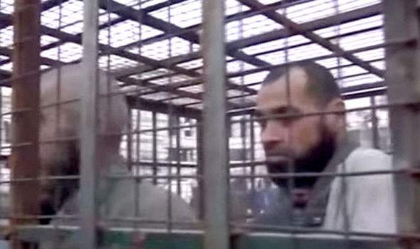 Monitor says Syrian rebels lock people in cages as human shields