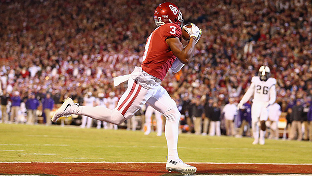 NORMAN OK- NOVEMBER 21 Sterling Shepard #3 of the Oklahoma Sooners makes a touchdown pass reception against the TCU Horned Frogs in the first quarter at Gaylord Family Oklahoma Memorial Stadium