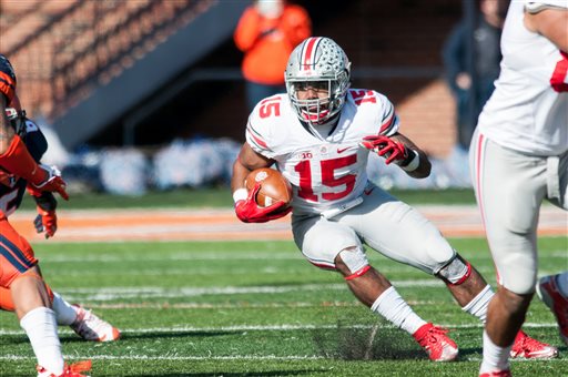 Ohio State running back Ezekiel Elliott runs the ball during the second quarter of an NCAA college football game against Illinois Saturday Nov. 14 2015 at Memorial Stadium in Champaign Ill