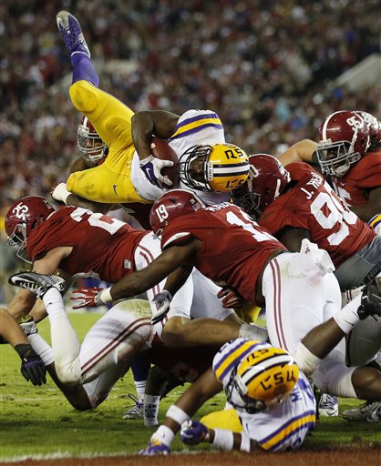 LSU running back Leonard Fournette tries to reach the end zone as the Alabama defense holds at the line in the second half of an NCAA college football game in Tuscaloosa Ala. The Heisman Trophy race gets real