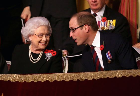 II centre attends the annual Festival of Remembrance with Prince Philip Prince William right and Kate the Duchess of Cambridge in London England Saturday Nov. 7 2015