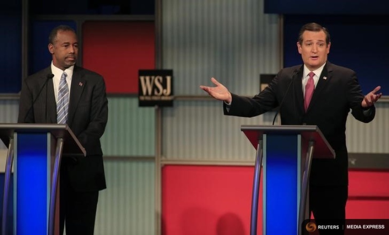 Republican U.S. presidential candidate Dr. Ben Carson listens as U.S. Sen. Ted Cruz speaks at the Republican presidential candidates debate in Milwaukee Wisconsin on Nov. 10 2015