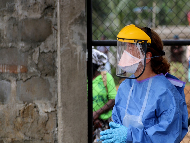 Health care worker with personal protective equipment