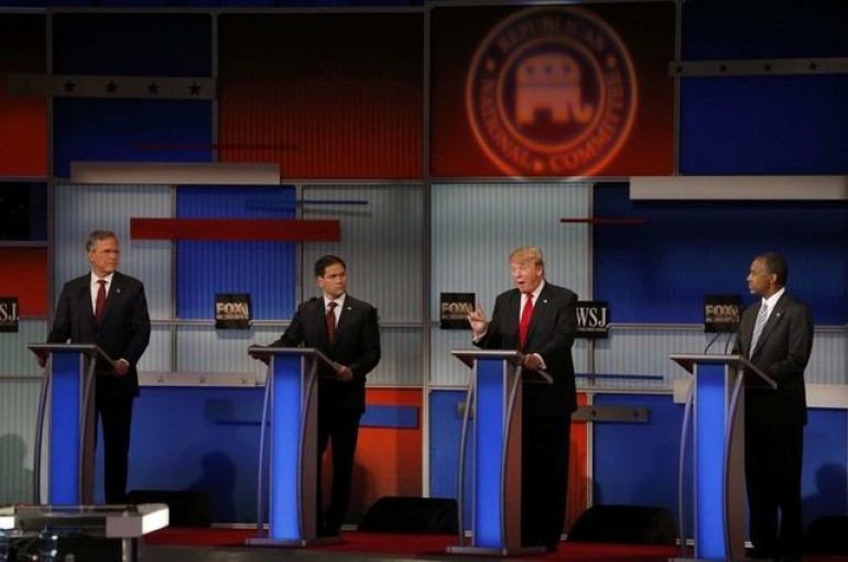 The candidates take part in the Republican presidential debate sponsored by Fox Business and the Wall Street Journal at the Milwaukee Theatre on Nov. 10 2015 in Milwaukee Wisconsin