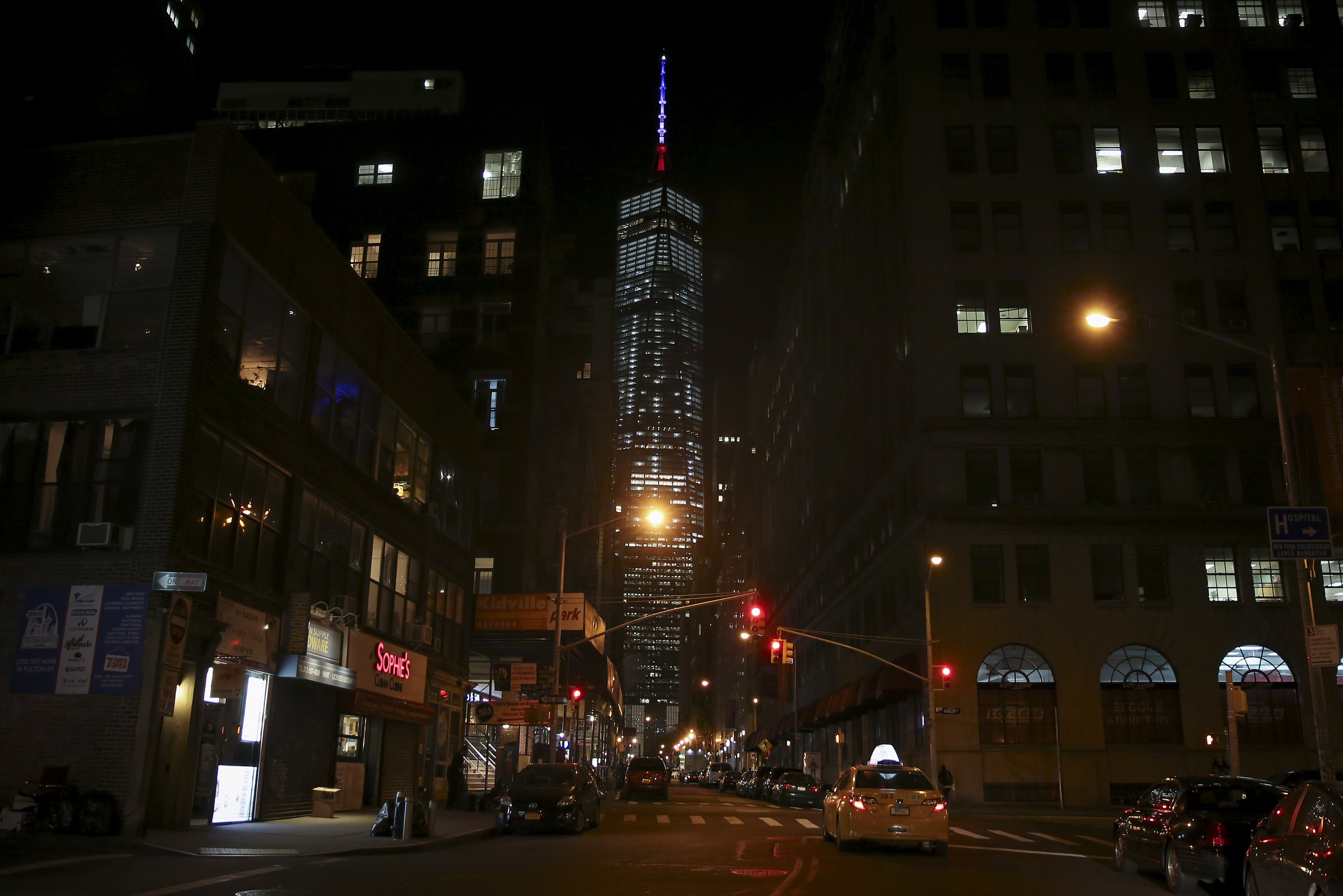 One World Trade Center also lit in the Blue White and Red colors of the French flag in honor of the victims of the attacks in Paris in the Manhattan borough of New York yesterday. – Reuters pic