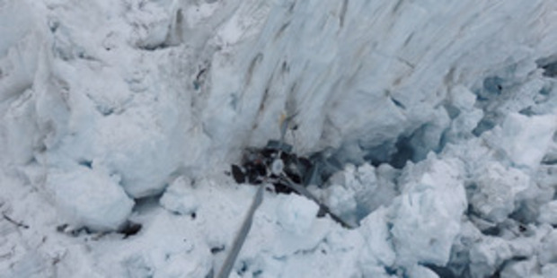 The wreckage of the helicopter which crashed killing all seven people on board in the crevasse on Fox Glacier