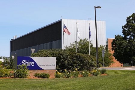 A sign sits in front of Shire's manufacturing facility in Lexington Massachusetts