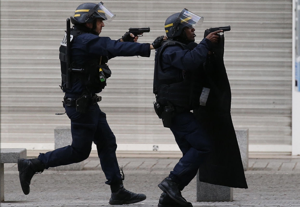 Shootout during police operation in Paris as French police widened hunt for