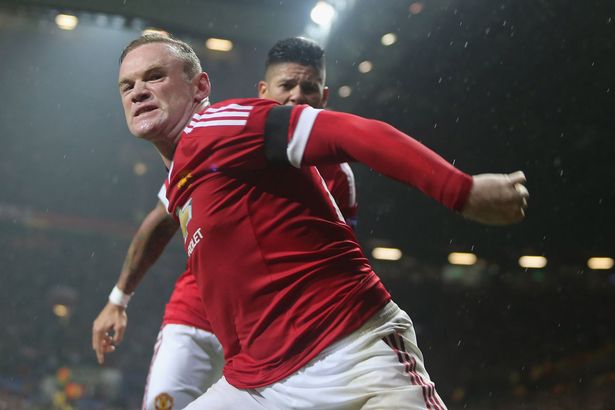 Wayne Rooney celebrates scoring the first goal