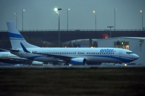 Enter Air flight ENT576 touches down in Glasgow after its departure from Beiruet with1st of the refugees to arrive in Scotland from Syria