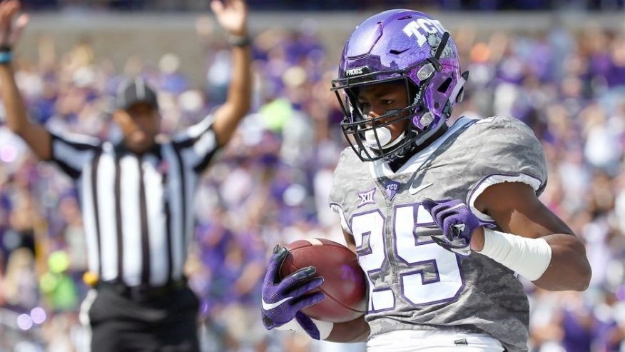 FORT WORTH TX- OCTOBER 03 Ka Vontae Turpin #25 of the TCU Horned Frogs scores a touchdown against the Texas Longhorns in the first half at Amon G. Carter Stadium