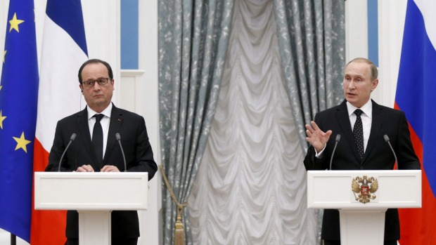 Russia's President Vladimir Putin and France's Francois Hollande agree to exchange intelligence on militant groups in Syria