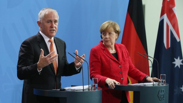 Mr Turnbull addresses the media with Ms Merkel following talks at the Chancellery. Mr Turnbull said'there needs to be a political solution in Syria