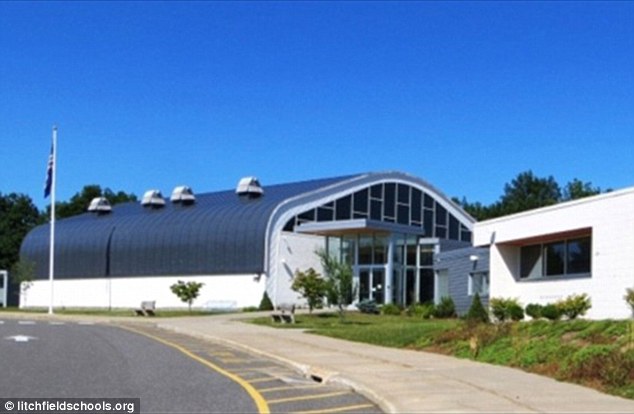 Two Litchfield High School pupils dressed in black trend coats baseball caps and sunglasses on Saturday in a chilling reference to the massacre that killed 12 students in Colorado 16 years ago