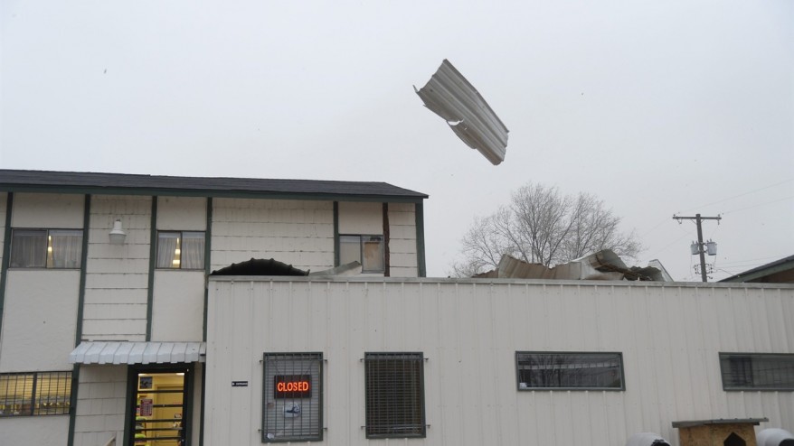 The Latest: Oregon woman trapped after tree falls on home